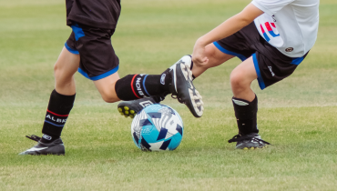 Children playing football